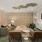 A large room with sofas and a tv