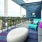well lit spacious outdoor lounge with comfortable seating