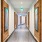 long hallway with art on walls